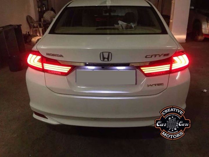 New Honda City with LED Tail Lights...

This  LEDs illuminate in a fluid and striking pattern to achieve an extraordinary effect with utilizes the maximum amount of wide- angled high-intensity LEDs, making your car more visible...

Replace your outdated lights with the custom look of LED taillights. These stout and stylish taillights offer modern design and safety for your ride. Their LED bulbs are more durable, longer lasting, and illuminate your vehicle with increased light output so you're better seen !!!

Invest in a sharp-looking pair of super-bright LED light bars to make your ride stand out in the crowd.

Come to Creative Motors for wide range of Variety n Style.

Visit Us at Creative Motors
Add :- 1&2, Ground Floor. Urvashi Complex,
Mithakhali Cross roads,
Navrangpura,
Ahmedabad, India 380009

You can also Call Creative Motors on
+91-9909999135

